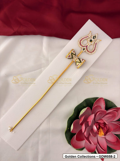 Trishul with Damaru for Idol Alankaram front view showing gold-tone trishul accessory with damaru motif, red, green and clear stone work, and pearl-style detailing for idol alankaram