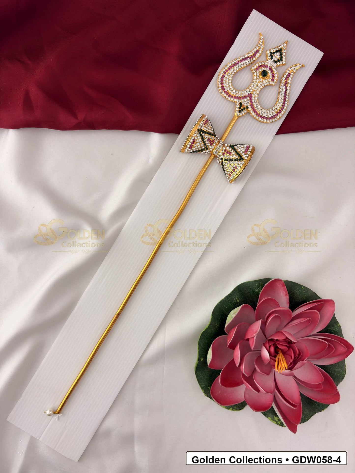 Trishul with Damaru for Idol Alankaram front view showing gold-tone trishul accessory with damaru motif, red, green and clear stone work, and pearl-style detailing for idol alankaram