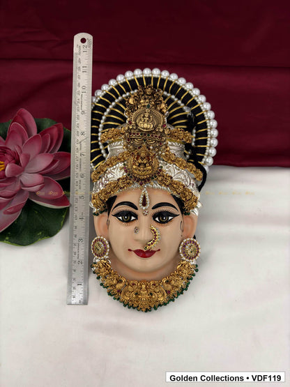 Measurement view of Varalakshmi Tanjore Face with Compact Deity Crown and Green Fringe Necklace with ruler beside the product