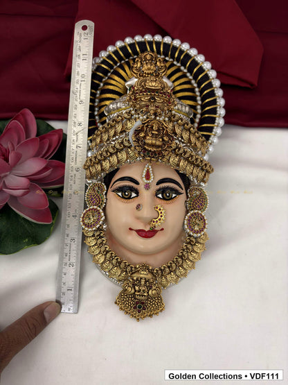 Measurement view of Varalakshmi Tanjore Face with Layered Deity Crown and Long Sculpted Pendant with ruler beside the product