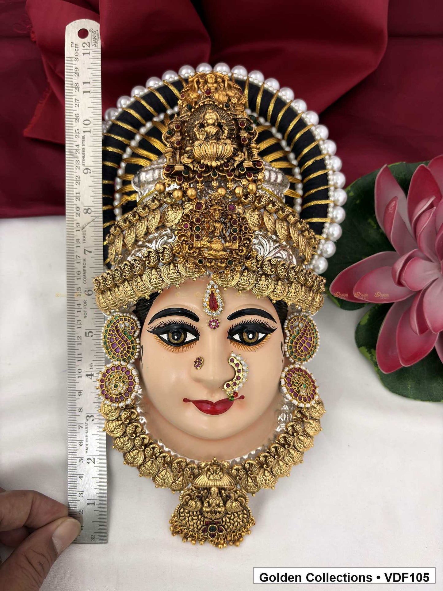 Varalakshmi Tanjore Face with Layered Figure Crown and Disc Pendant close-up detail view