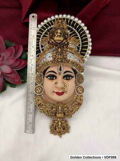 Varalakshmi Tanjore Face with Layered Motif Crown and Long Drop Pendant close-up detail view