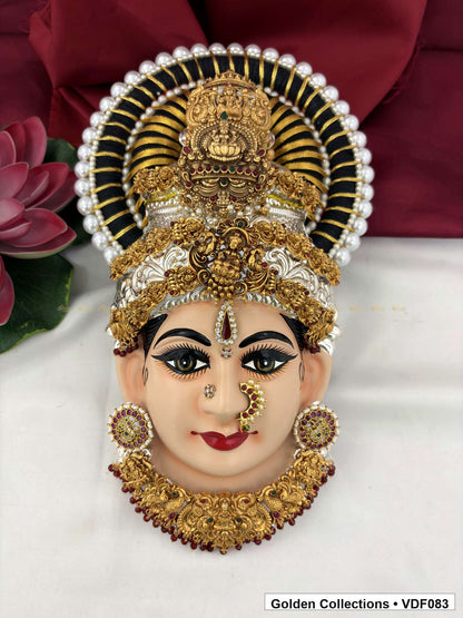 Varalakshmi Tanjore Face with Layered Motif Crown and Red-Green Necklace full front view