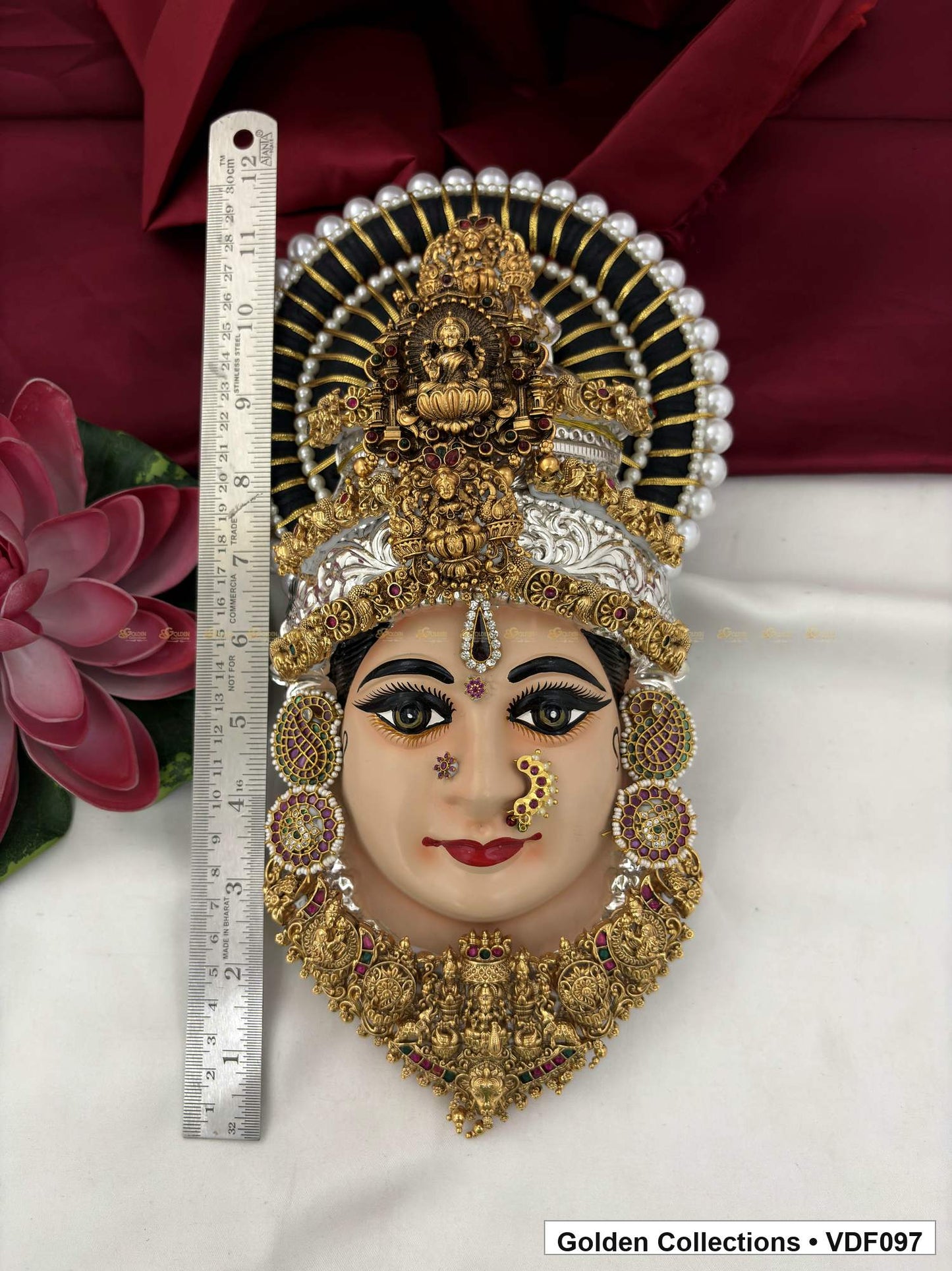 Varalakshmi Tanjore Face with Pearl-Halo Crown and Pointed Temple Necklace close-up detail view