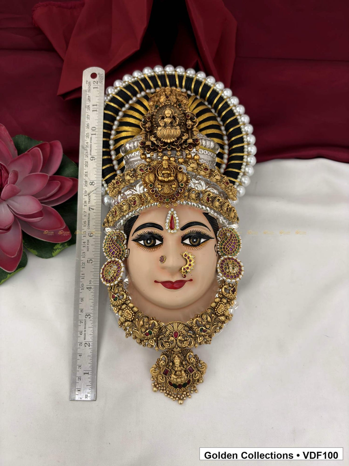 Varalakshmi Tanjore Face with Round Figure Crown and Compact Drop Pendant close-up detail view