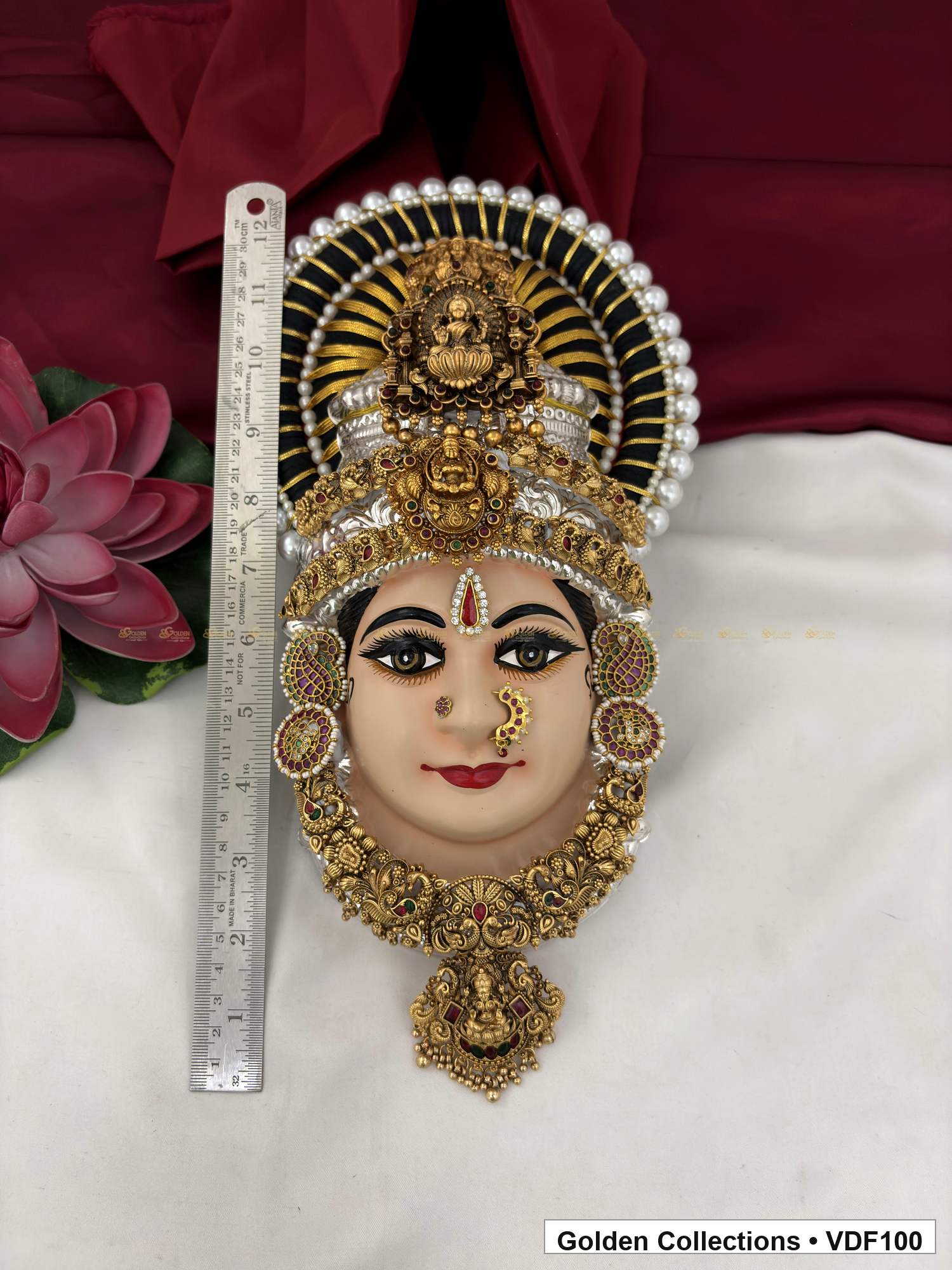 Varalakshmi Tanjore Face with Round Figure Crown and Compact Drop Pendant close-up detail view