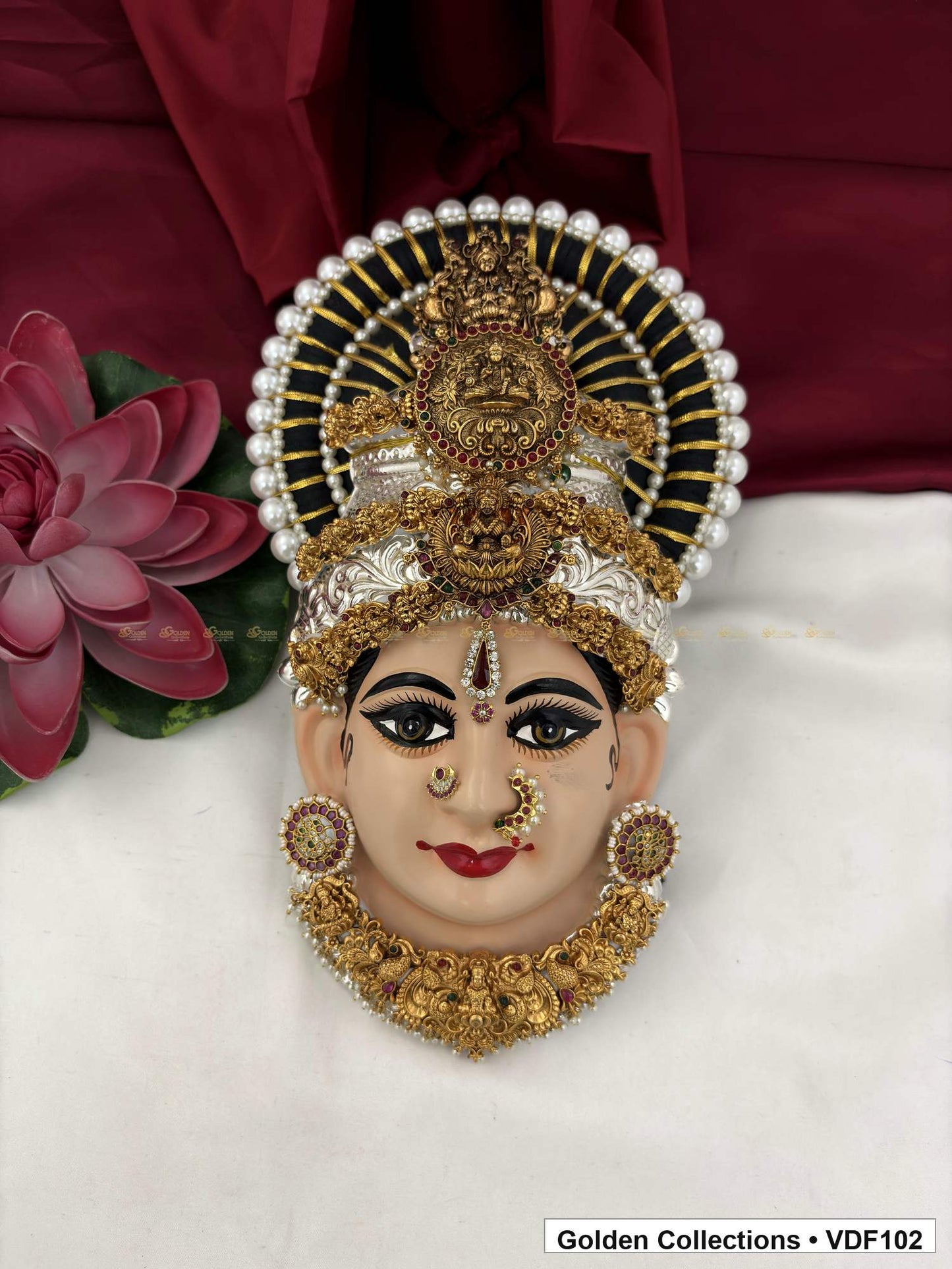 Varalakshmi Tanjore Face with Round Medallion Crown and Green Fringe Necklace full front view