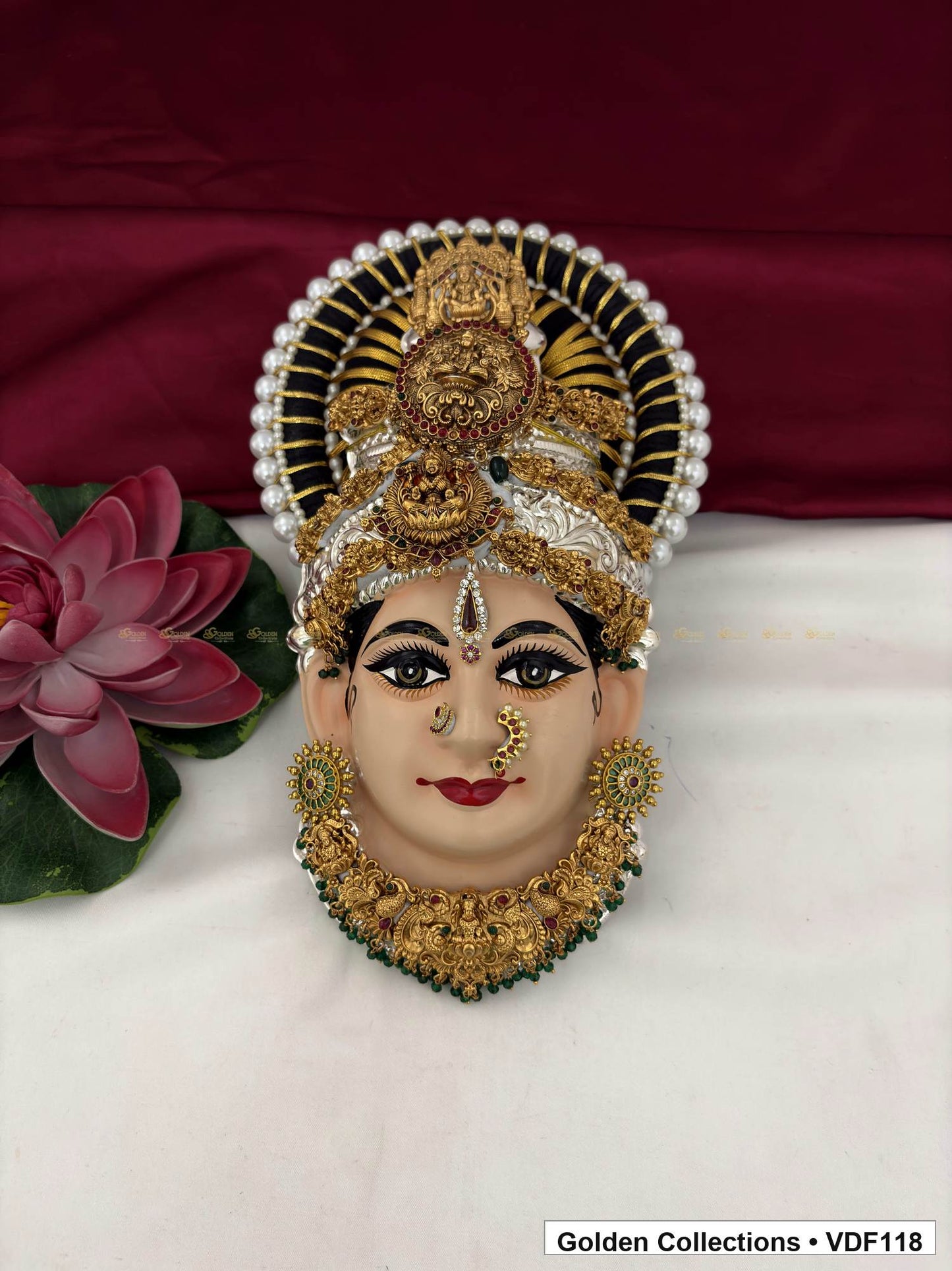 Varalakshmi Tanjore Face with Round Red Medallion Crown and Green Fringe Necklace full front view