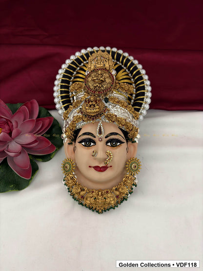 Varalakshmi Tanjore Face with Round Red Medallion Crown and Green Fringe Necklace full front view