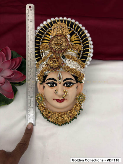 Measurement view of Varalakshmi Tanjore Face with Round Red Medallion Crown and Green Fringe Necklace with ruler beside the product