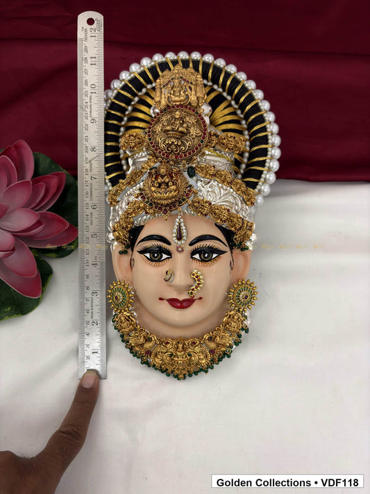 Measurement view of Varalakshmi Tanjore Face with Round Red Medallion Crown and Green Fringe Necklace with ruler beside the product