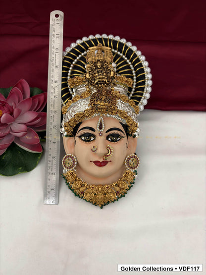 Measurement view of Varalakshmi Tanjore Face with Tall Figure Crown and Green Bead Fringe Necklace with ruler beside the product