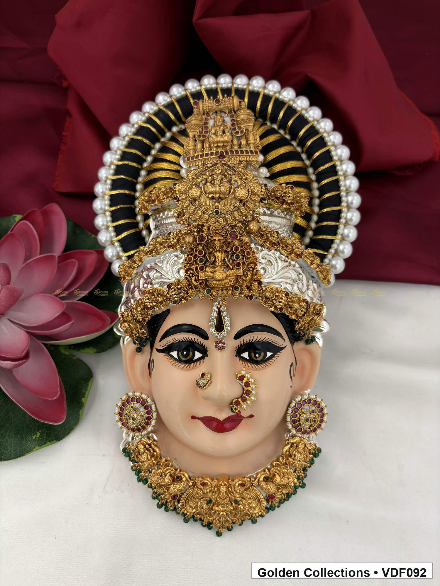 Varalakshmi Tanjore Face with Tall Sculpted Crown and Green Fringe Necklace full front view