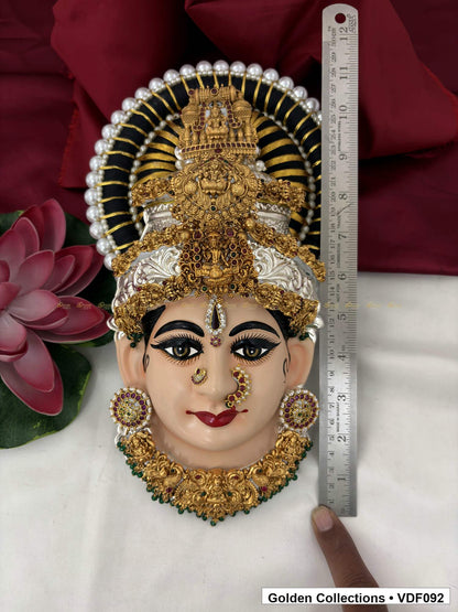 Varalakshmi Tanjore Face with Tall Sculpted Crown and Green Fringe Necklace close-up detail view