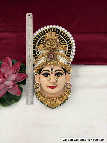 Measurement view of Varalakshmi Tanjore Face with Teardrop Medallion Crown and Broad Floral Necklace with ruler beside the product