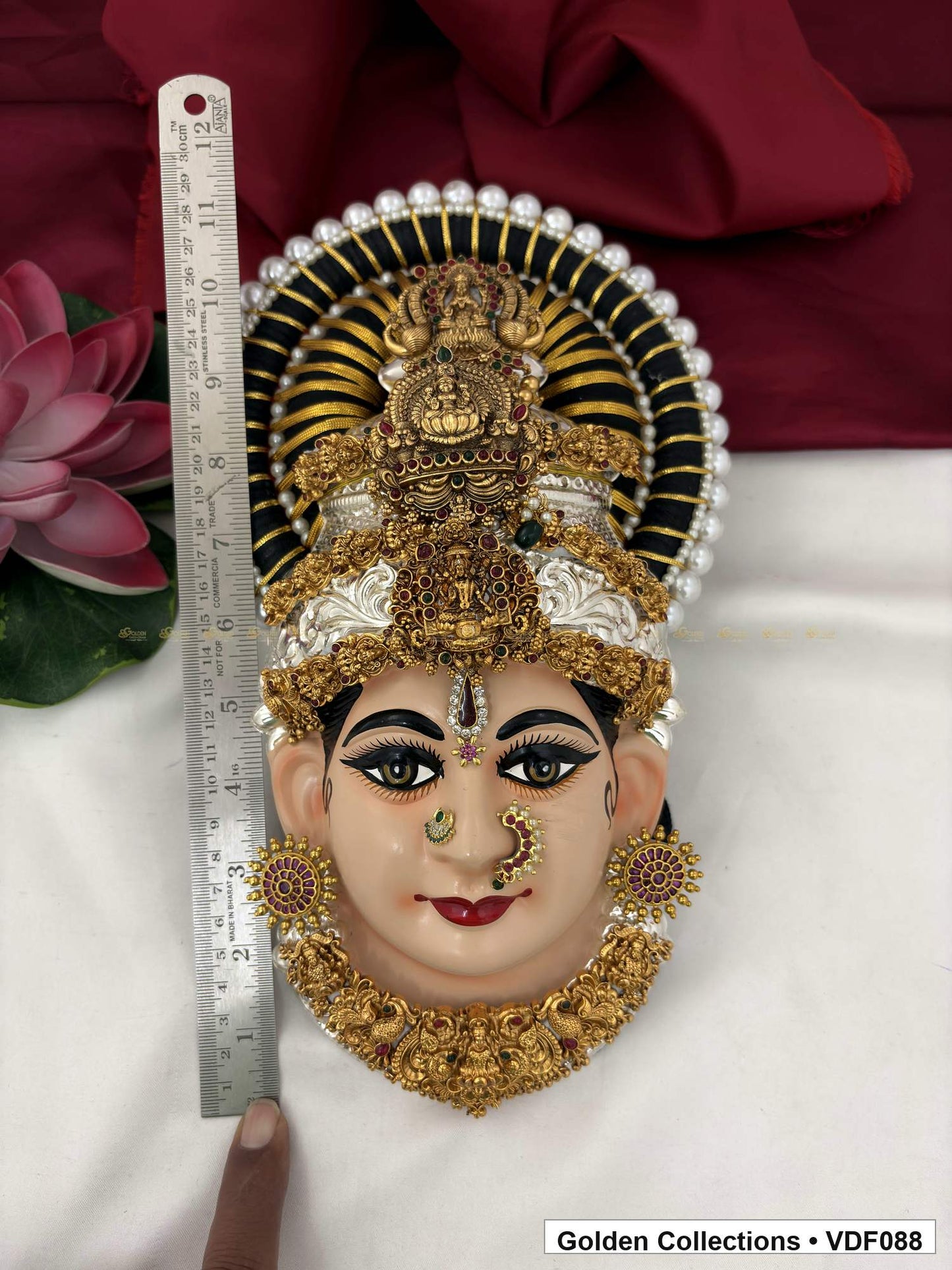 Varalakshmi Tanjore Face with Triple Figure Crown and Sculpted Necklace close-up detail view