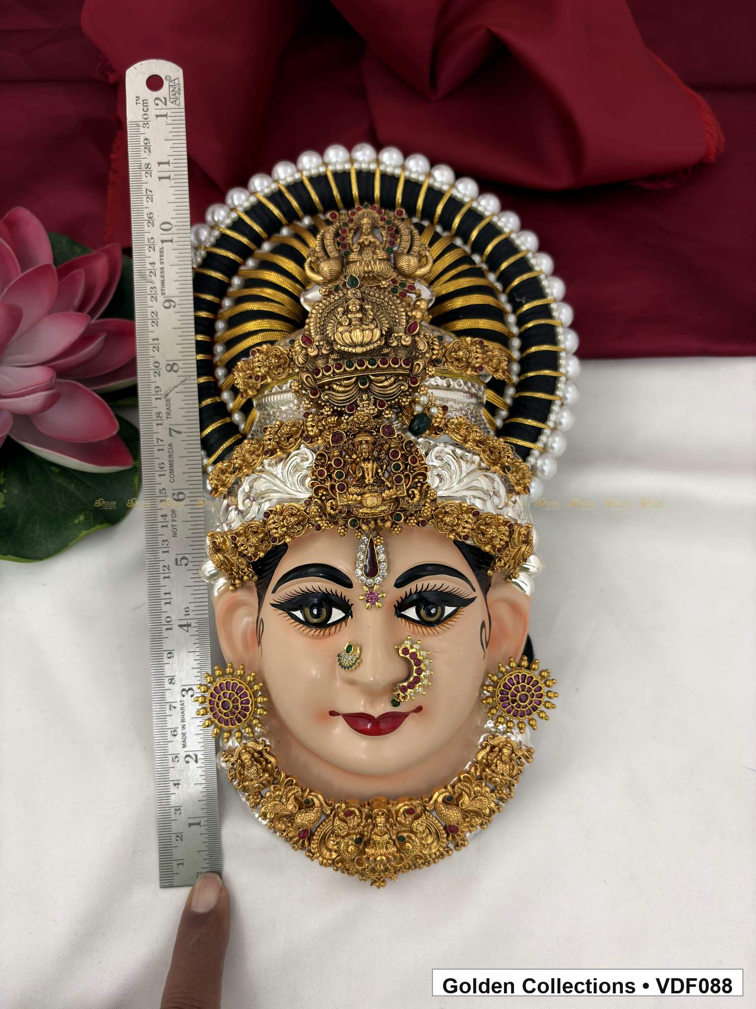 Varalakshmi Tanjore Face with Triple Figure Crown and Sculpted Necklace close-up detail view