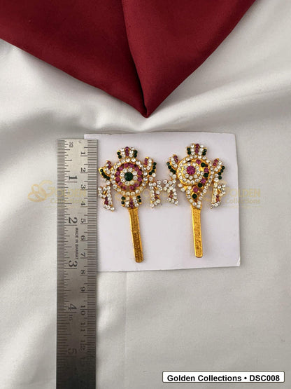 Measurement photo showing 2.5 x 1.25 Inches shanku chakra pair with ruler for Vishnu idol alankaram