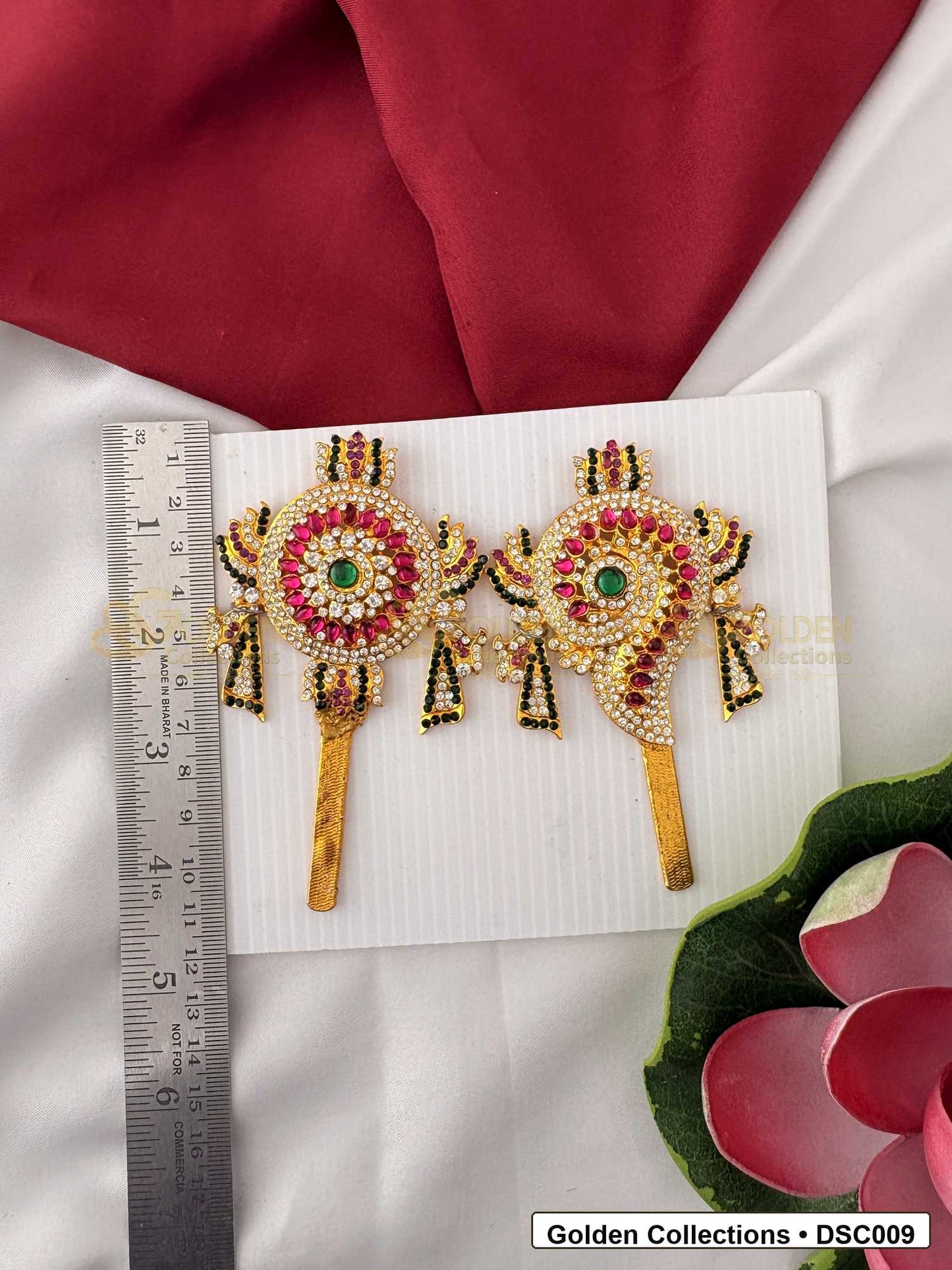 Measurement photo showing 4 x 2.25 Inches shanku chakra pair with ruler for Vishnu idol alankaram