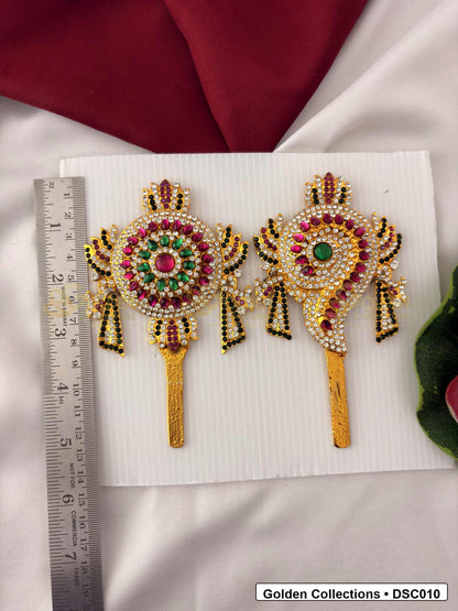 Measurement photo showing 5 x 2.75 Inches shanku chakra pair with ruler for Vishnu idol alankaram