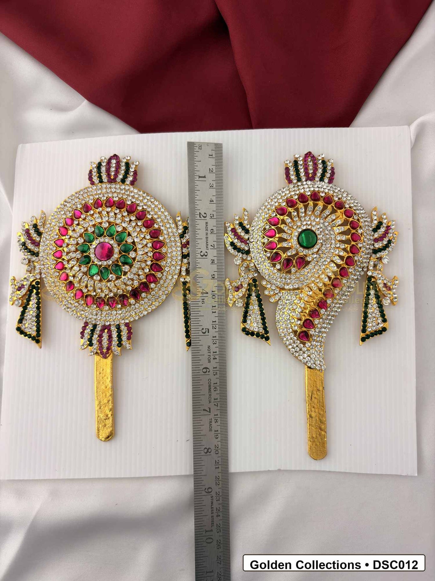 Measurement photo showing 8 x 4.75 Inches shanku chakra pair with ruler for Vishnu idol alankaram