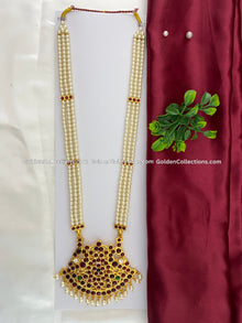 Bharatanatyam long haram with pearl strands and kemp-style pendant