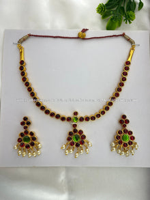Bharatanatyam short necklace with red, green and clear stones, shown with matching earrings BSN-027